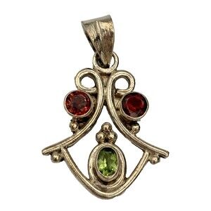 Elegant Silver Pendant with Red and Green Stones